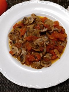 Una foto de Champiñones a la provenzal