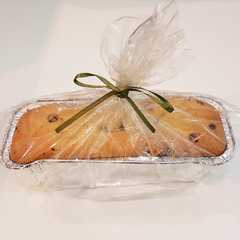 A picture of Budín inglés con frutos secos y chips 🍞🌟.