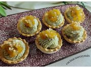 Una foto de canapes de manzana