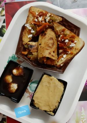 A picture of Veggies Peanut Hummus Roti and Bread Wraps & Imli and Banana Chutney.