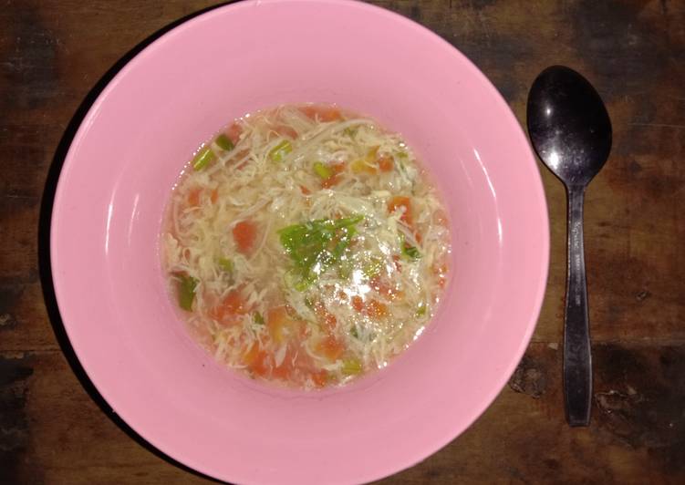 Tomato egg soup with enoki