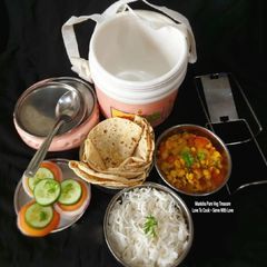 A picture of Rice Roti Salad Lauki Chanadal Sabzi - Mini Meal Office Lunch Tiffin.