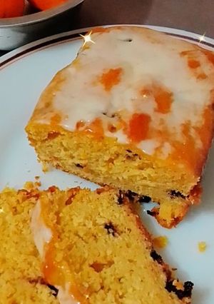 Una foto de Budín de mandarinas con chips de chocolate.😋😊