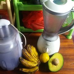 A picture of Avocadao, banana and orange juice.