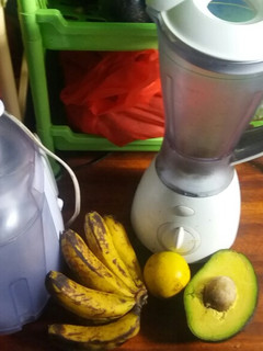 A picture of Avocadao, banana and orange juice.