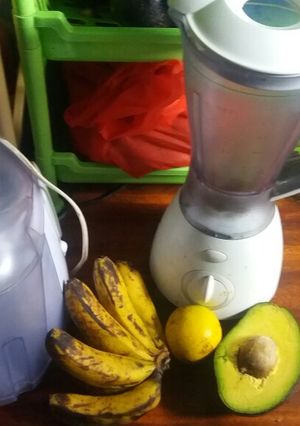 A picture of Avocadao, banana and orange juice.