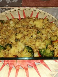 Una foto de Coliflor y brócoli aromatizado con especias al horno