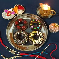 Suji gulab jamun donuts A picture of Suji gulab jamun donuts.