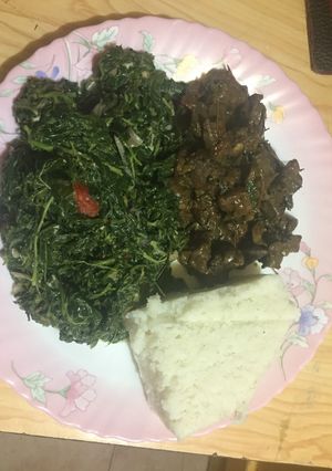 A picture of Managu with fried liver served with ugali.