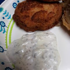 A picture of Salted, Cod Patties, with Sauce.