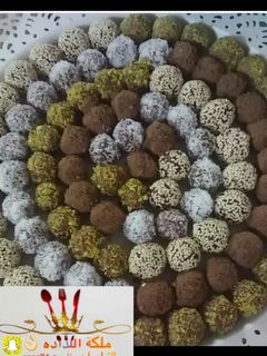 صورة لوصفة حلى كرات التمر محشي بلوز