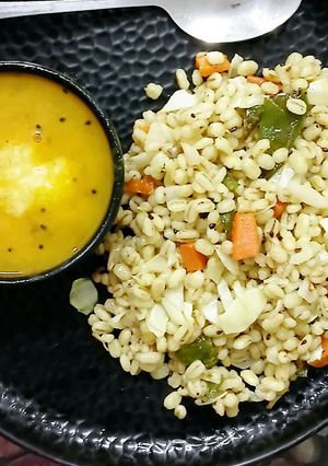A picture of Mix Veg Barley Upma with Toor Dal.