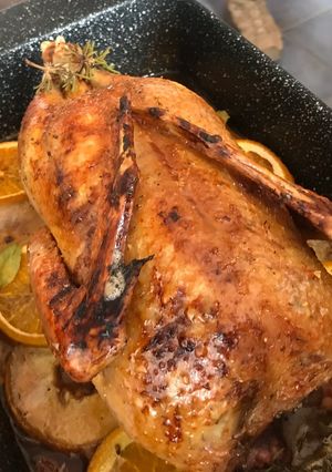 Una foto de Pato asado y relleno