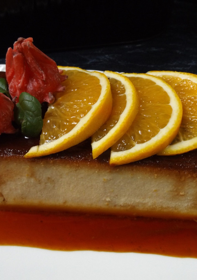 Una foto de Mi budín de pan y bizcocho a la naranja