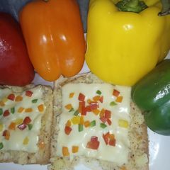 A picture of Colourful cheese toast.