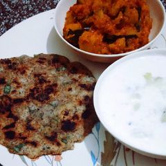 Swaang atta Aloo Paratha with pumpkin sabzi and aloo raita A picture of Swaang atta Aloo Paratha with pumpkin sabzi and aloo raita.