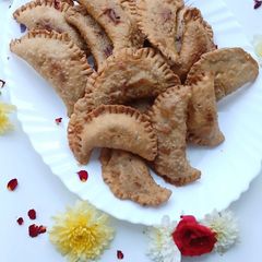 A picture of Coconut Stuffed Wheat Flour Gujiya.