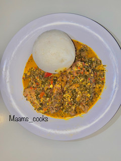 A picture of Tuwo with moringa soup.