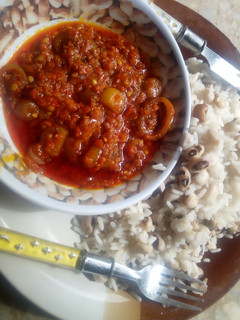 A picture of Riceand beans with stew.