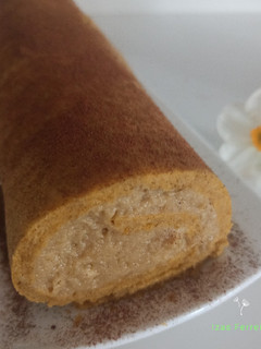 Una foto de Brazo gitano de zanahoria relleno de crema de manzana