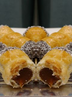 Una foto de Cañoncitos de dulce de leche