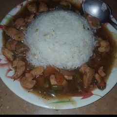 A picture of Chickn manchorion with garlic rice.