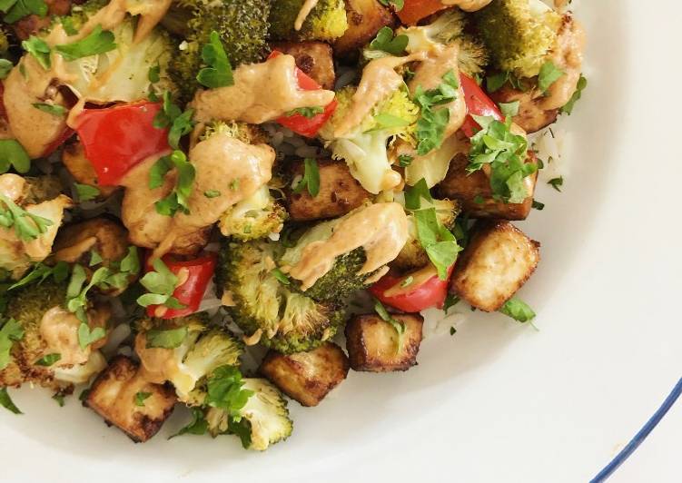 Crispy baked tofu with roasted vegetables and peanut butter sauce