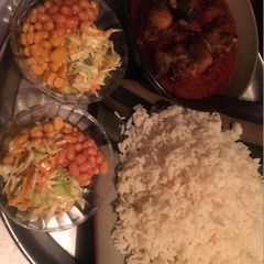 A picture of Rice chicken stew with salad 🥗.