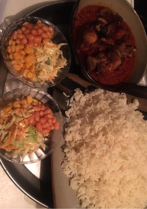 A picture of Rice chicken stew with salad 🥗.