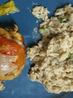 Una foto de Pollo al horno con risotto al champigñon