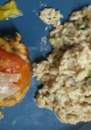 Una foto de Pollo al horno con risotto al champigñon