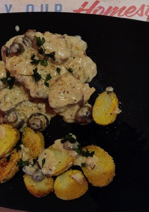 Una foto de Solomillo a la crema y champiñones