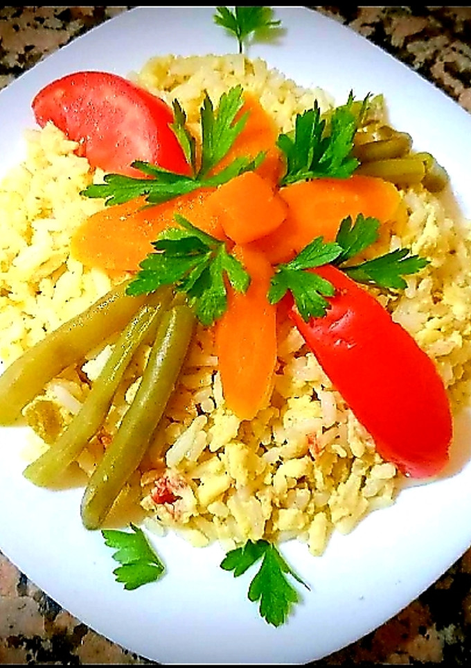 Una foto de Arroz con huevos