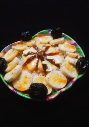 A picture of Poha with mixed fruit fusion raita.