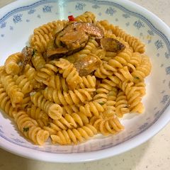 A picture of Mushroom Tom Yum Goong Pasta.