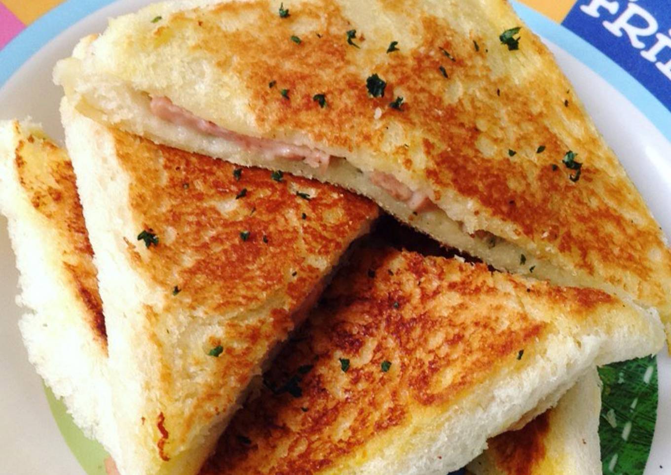 Bread with bacon and cheese toppings
