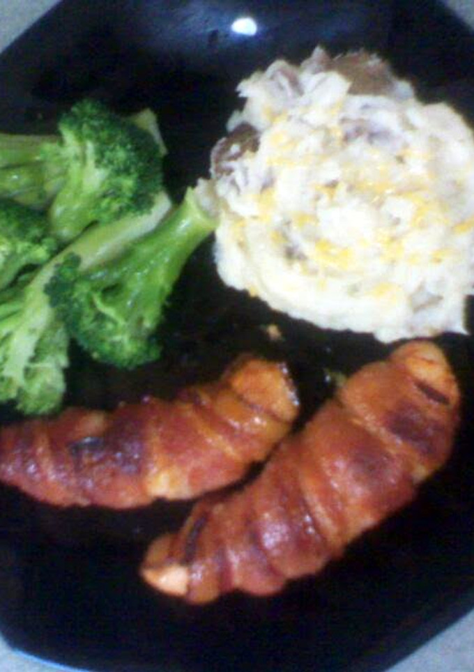 A picture of bacon wrapped chicken breast.