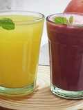 Sweet lime and grape carrot juice
