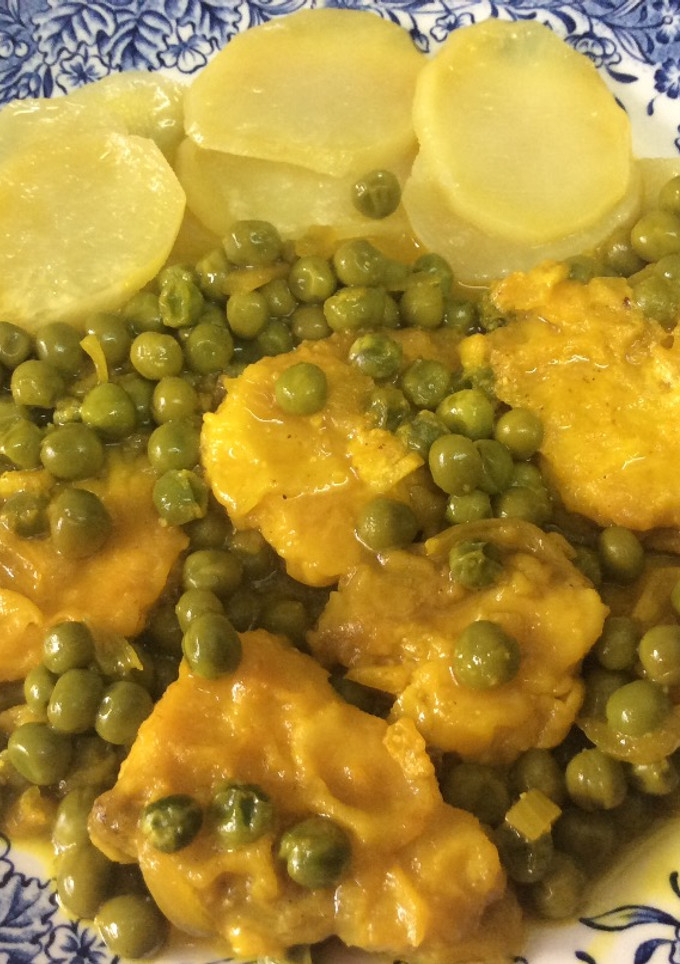 Una foto de Tintorera con guisantes en amarillo