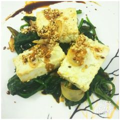 Toffu with grilled spinach A picture of Toffu with grilled spinach.