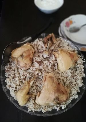 A picture of Mansaf Rice with Ground Meat and Chicken.