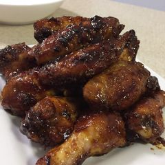 A picture of Chicken Wings with Honey Spicy BBQ sauce.