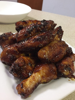 A picture of Chicken Wings with Honey Spicy BBQ sauce.