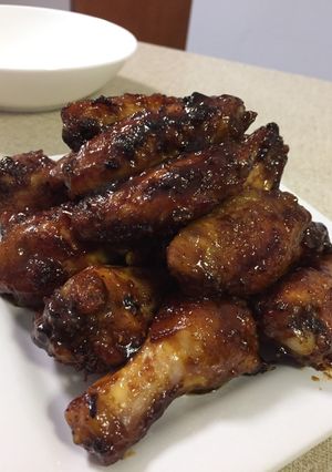 A picture of Chicken Wings with Honey Spicy BBQ sauce.