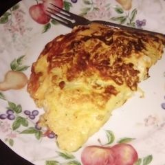 A picture of Cheese and hard salami omelette.