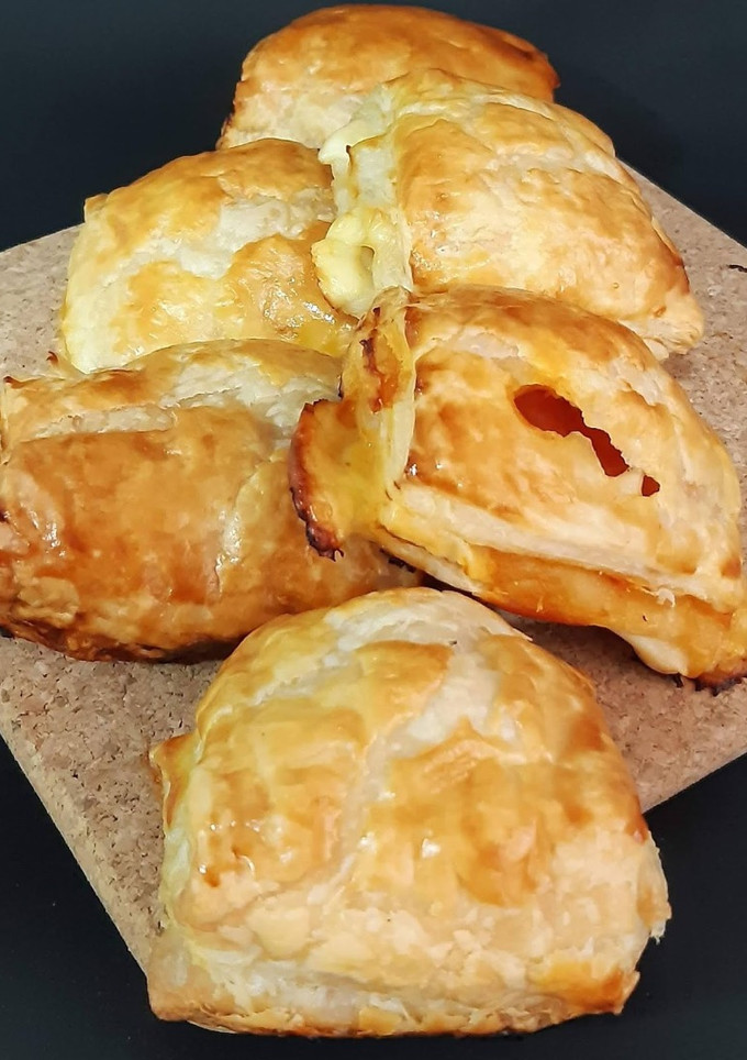 Una foto de Napolitanas de bacon y queso