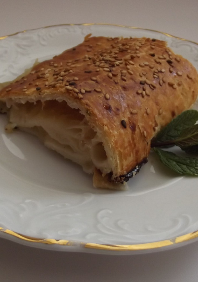 Una foto de Tronco de hojaldre relleno con compota de manzana