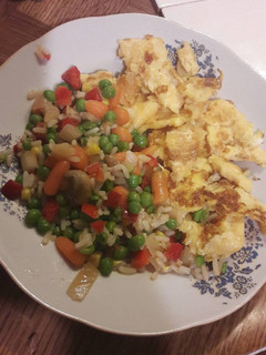 A picture of Veggies in butter with cheese omelette.