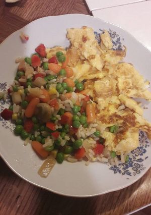 A picture of Veggies in butter with cheese omelette.