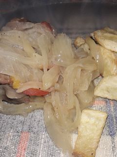 Una foto de Carne al vino blanco